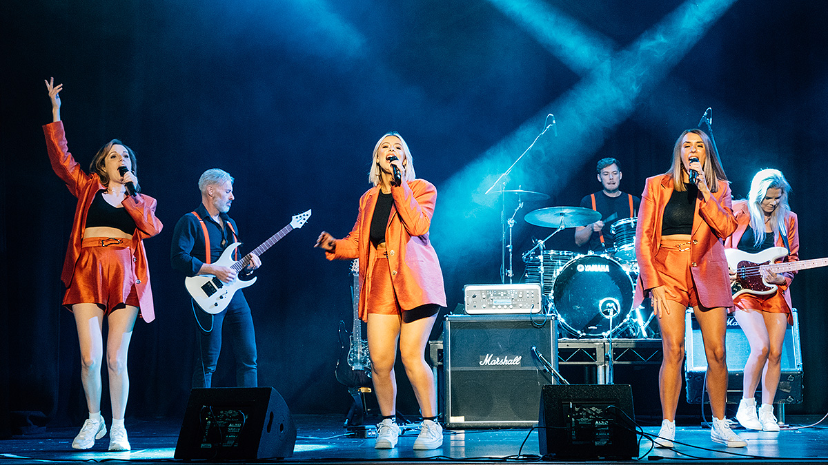 The Sisterhood performing live